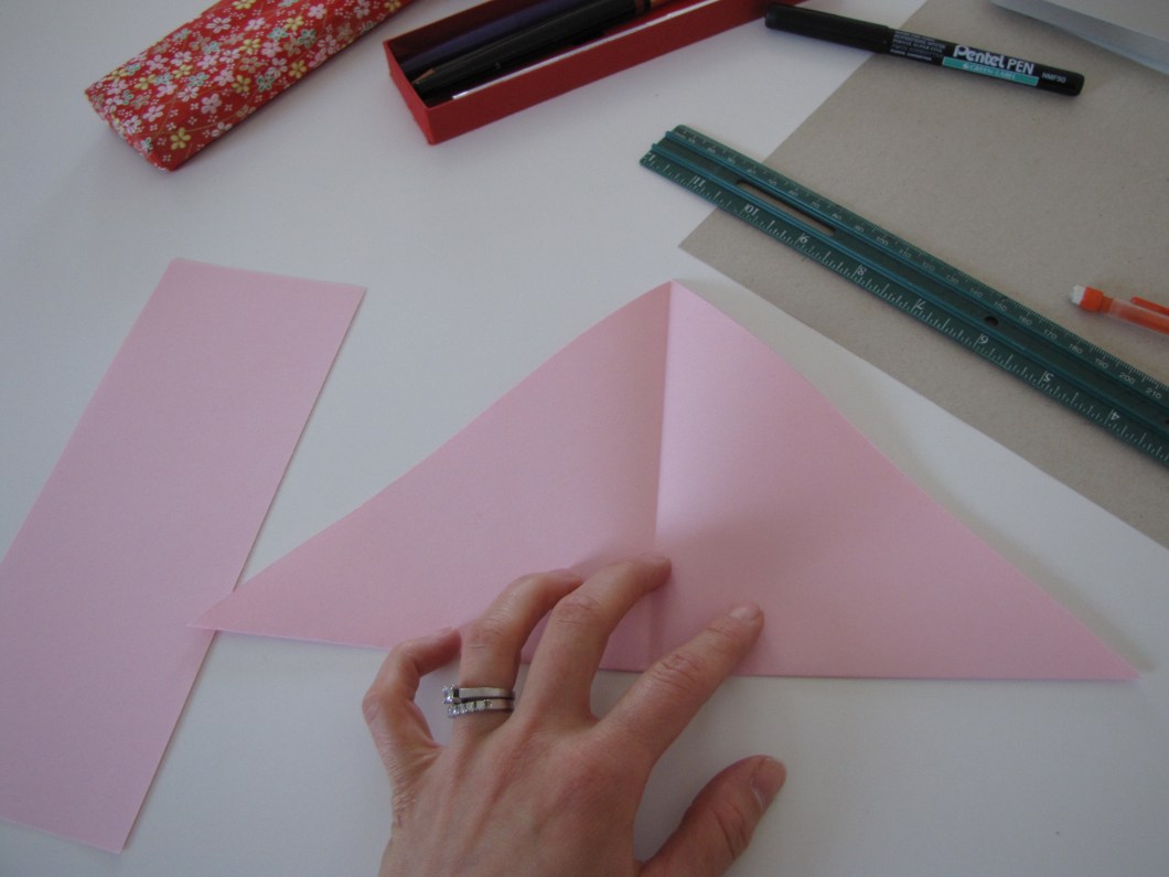 Open the large triangle back up.