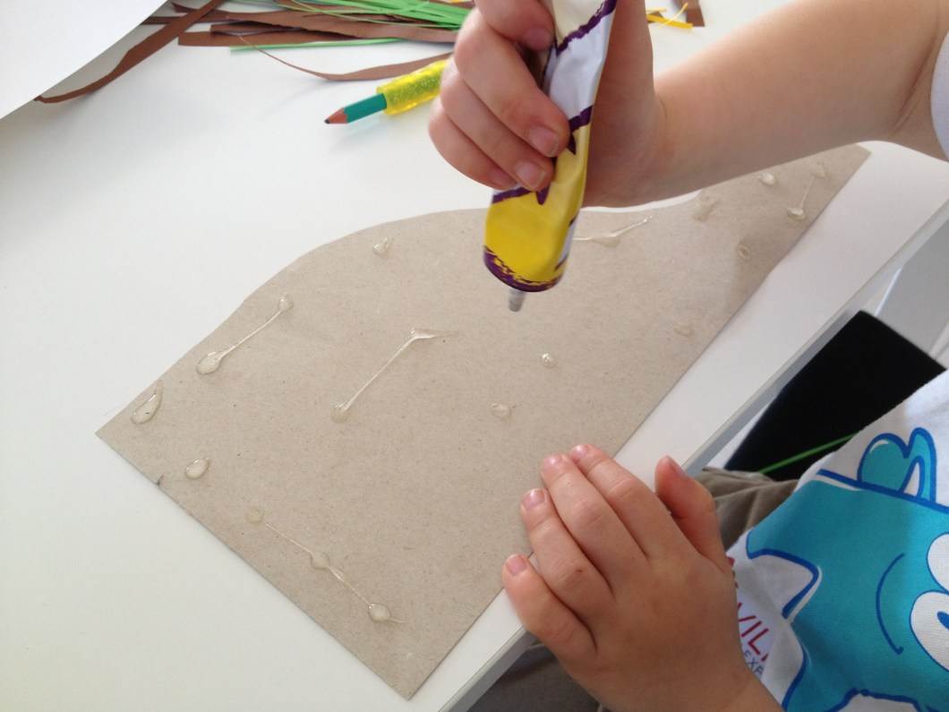 Glue your nest onto a piece of white paper.