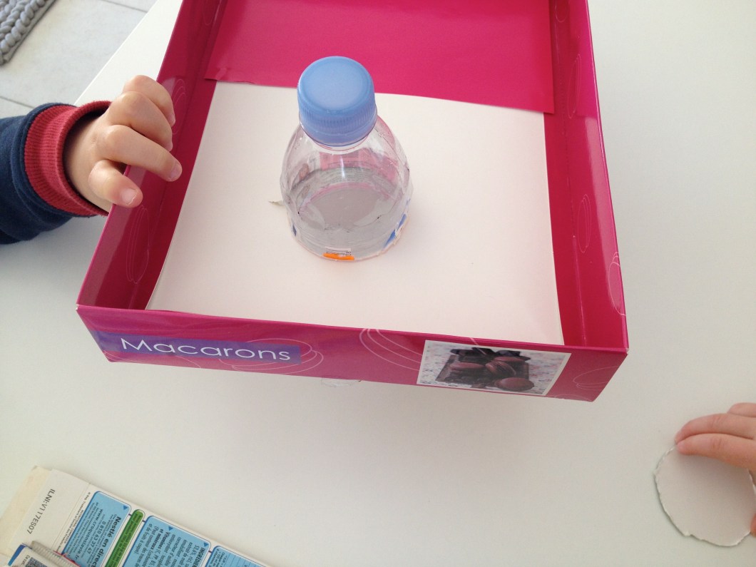 Pass your bottle through the hole to make sure that it's large enough.