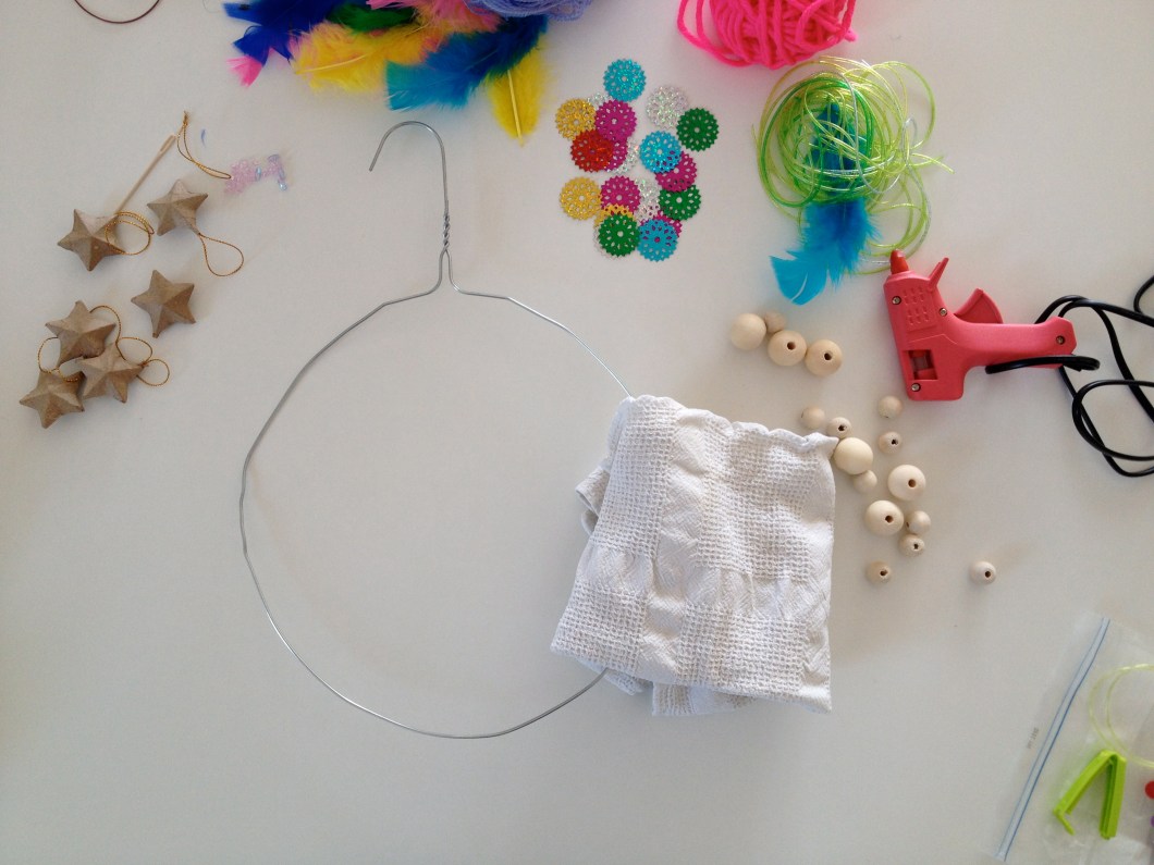 Use a tea towel to help you manipulate the wire without hurting your hands.