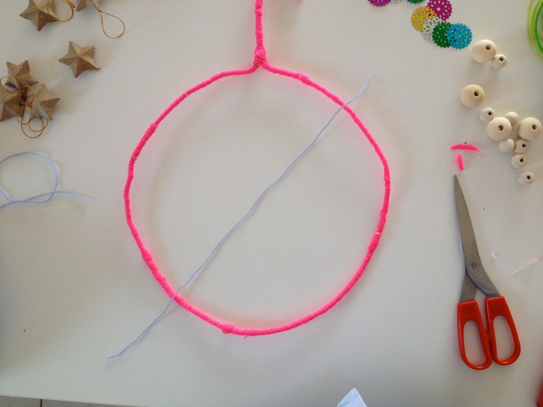 cut a piece of wool that is longer than the diameter of your circle