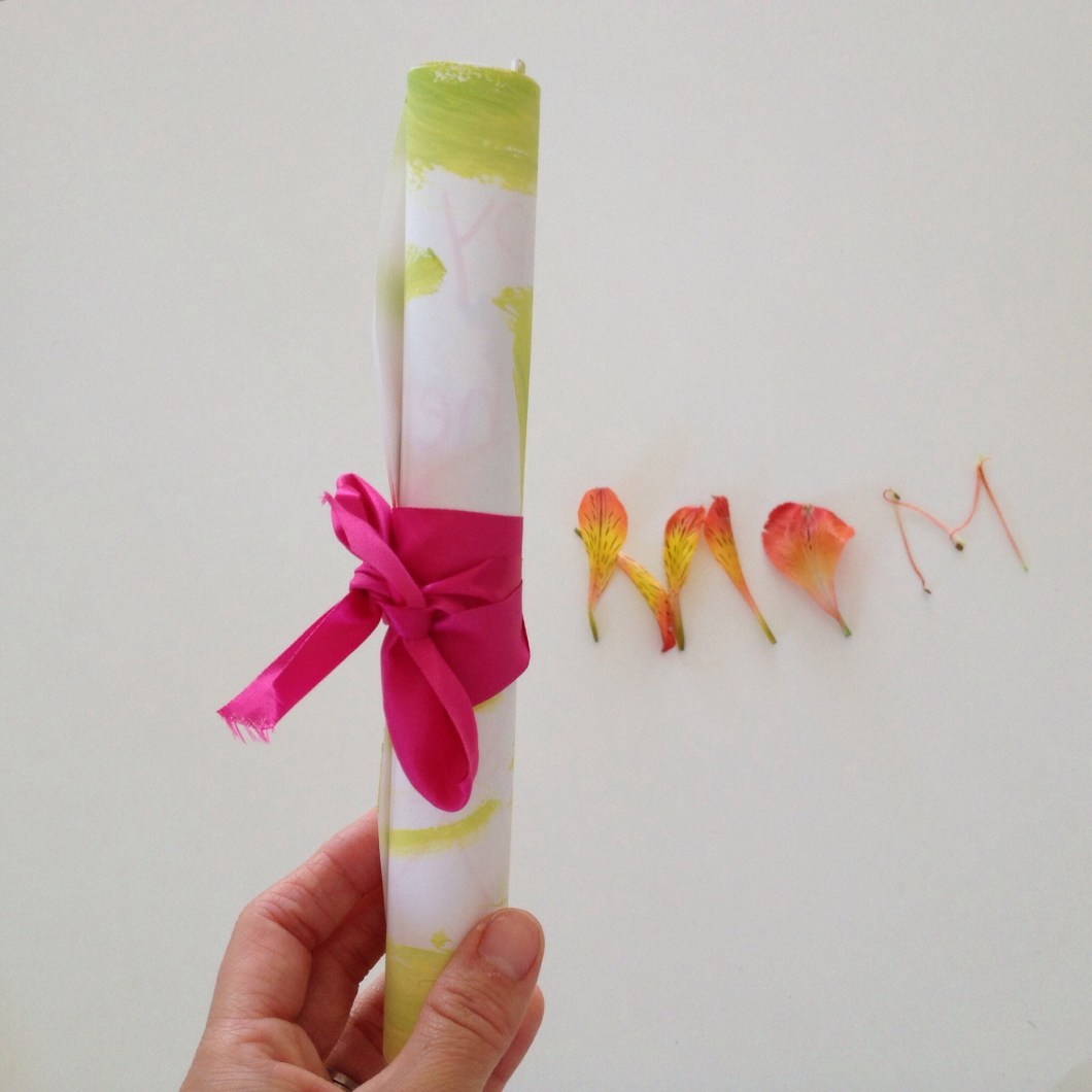 Roll up your card and add a ribbon.